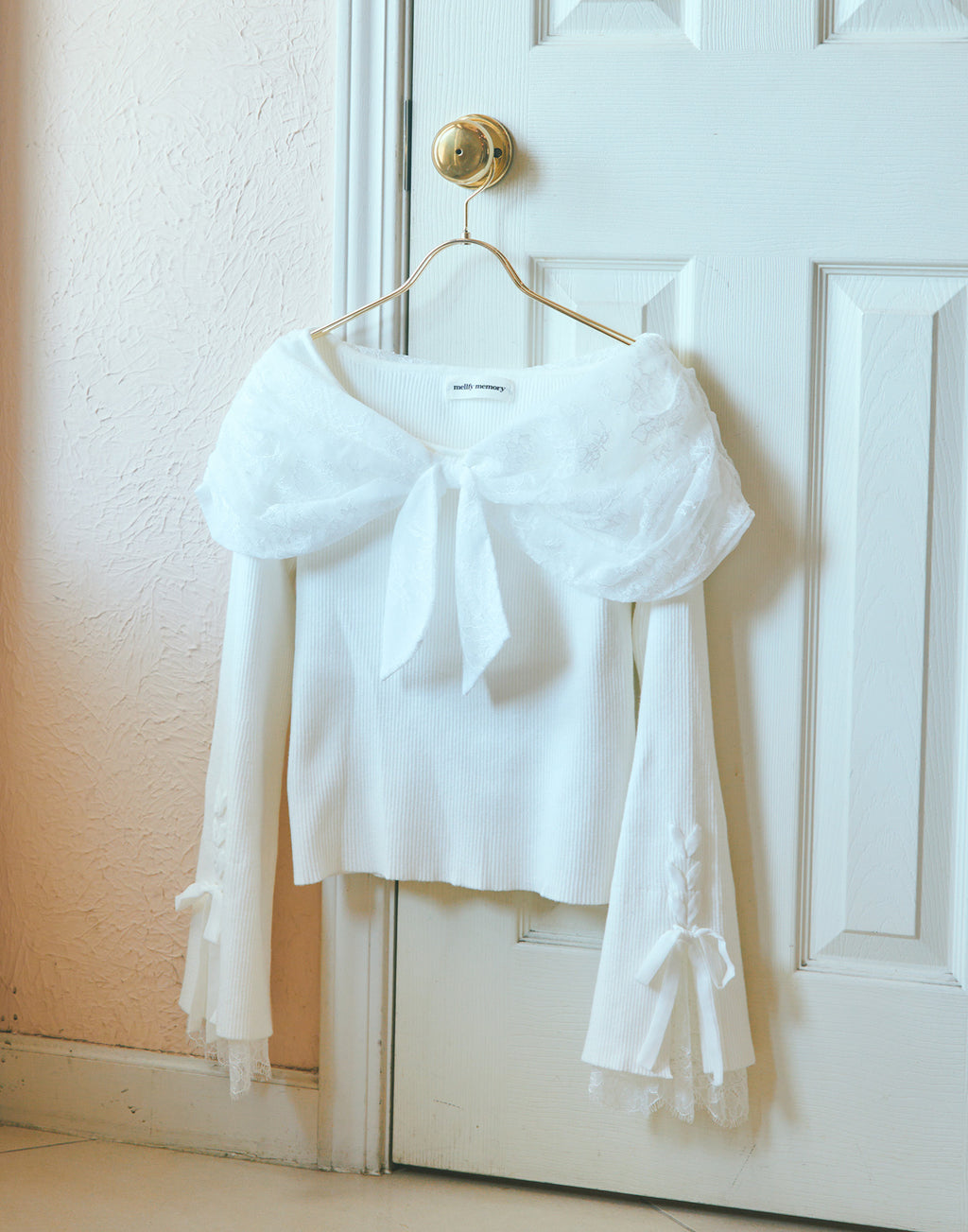 mellfy memory Melty race flare sleeve cape knit