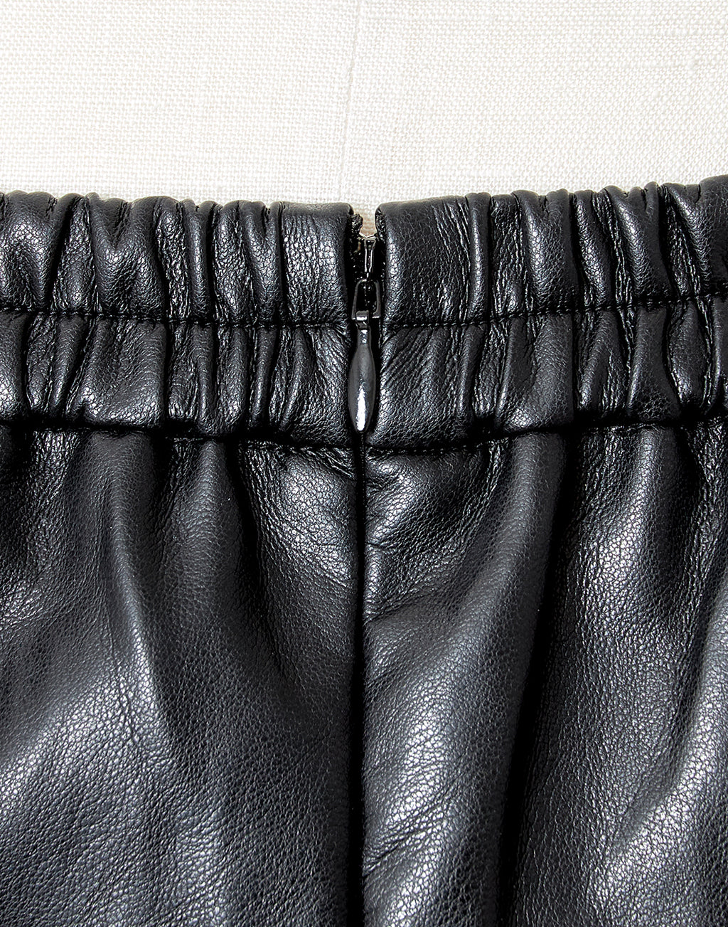 AVENCHUMU Leather look hole ribbon skirt