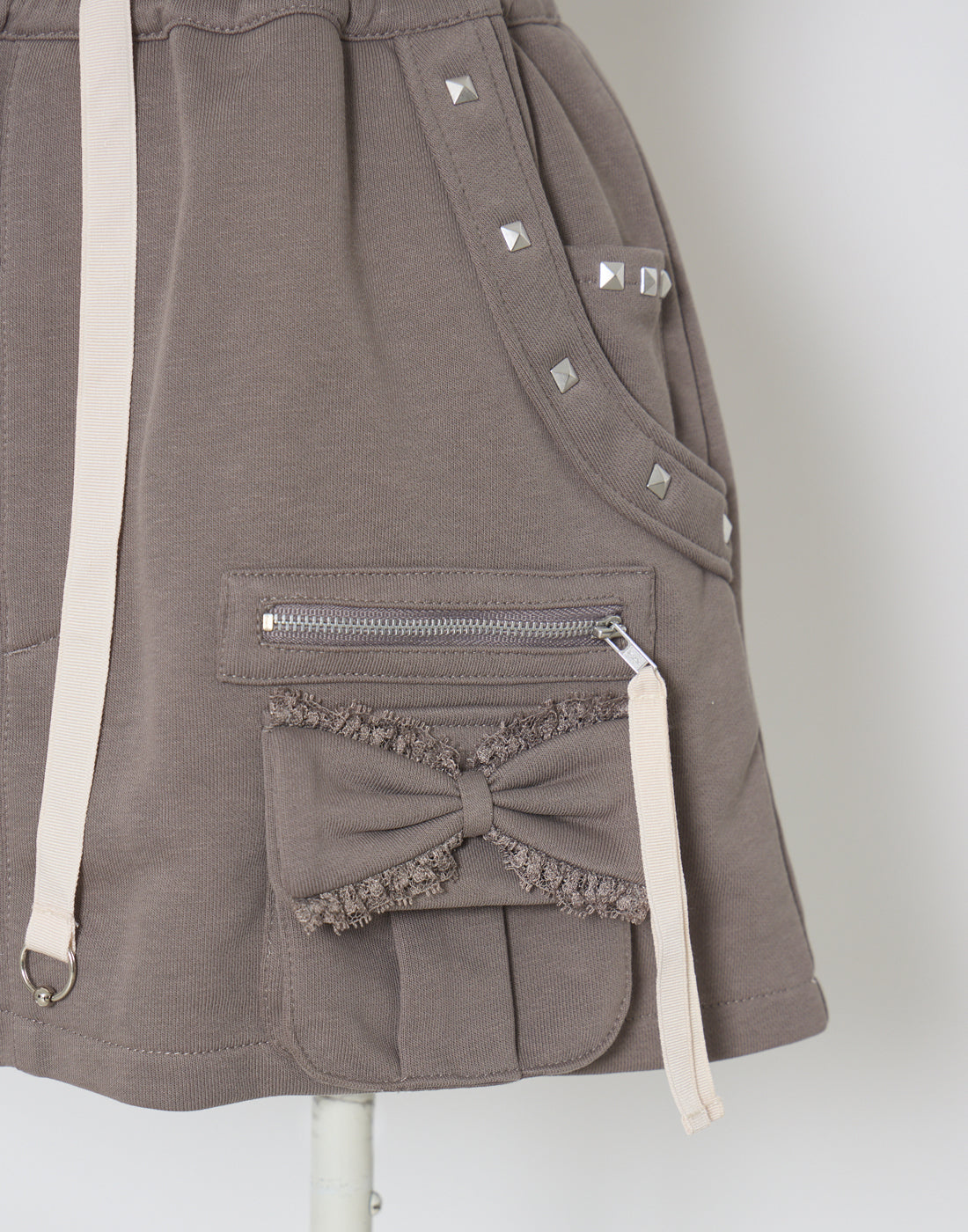 AVENCHUMU Ribbon pocket studded sweat skirt